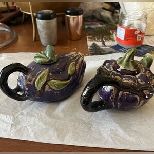 Two mini teapots.